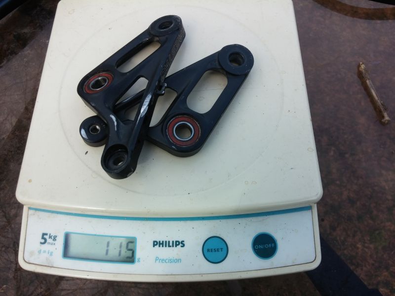 Anthem X 2010 linkage plates on scale at 115g