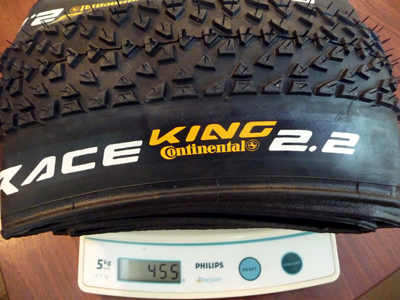 Picture of Continental Race King Supersonics 2.2 being weighed at 455 grams