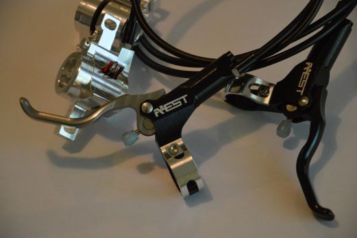 AEST disk brakes showing extensive CNC machining
