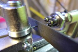 Filing spoke end flat