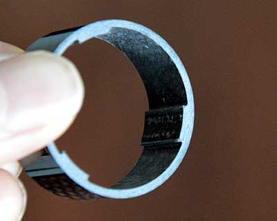 Close-up of spacer showing internal machining of the carbon fibre